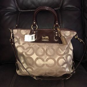 Brown and gold coach hand bag